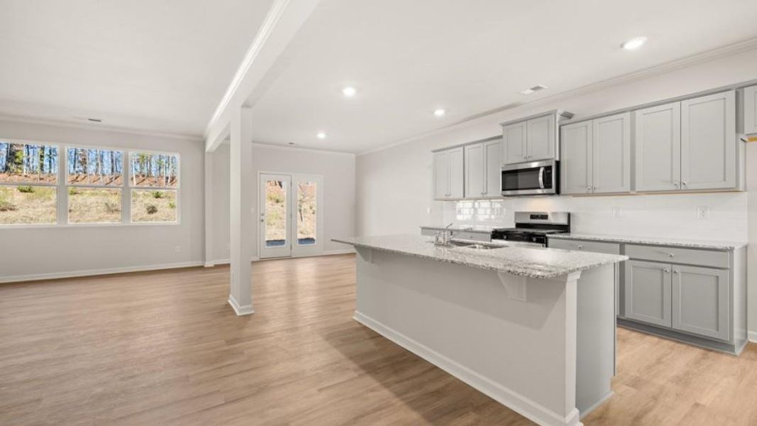 Furnished interior view inside a new home in Northwoods at Mirror Lake, Villa Rica (Image 4).