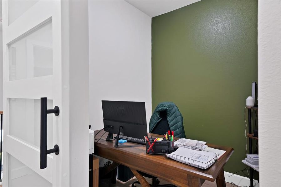 White interior door with glass panels and a black modern handle White interior door with glass panels and a black modern handle