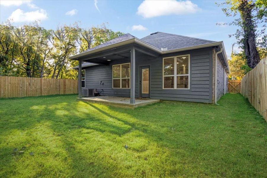Exterior details and patio area of a home in , Denison (Image 3). Exterior details and patio area of a home in , Denison (Image 3).