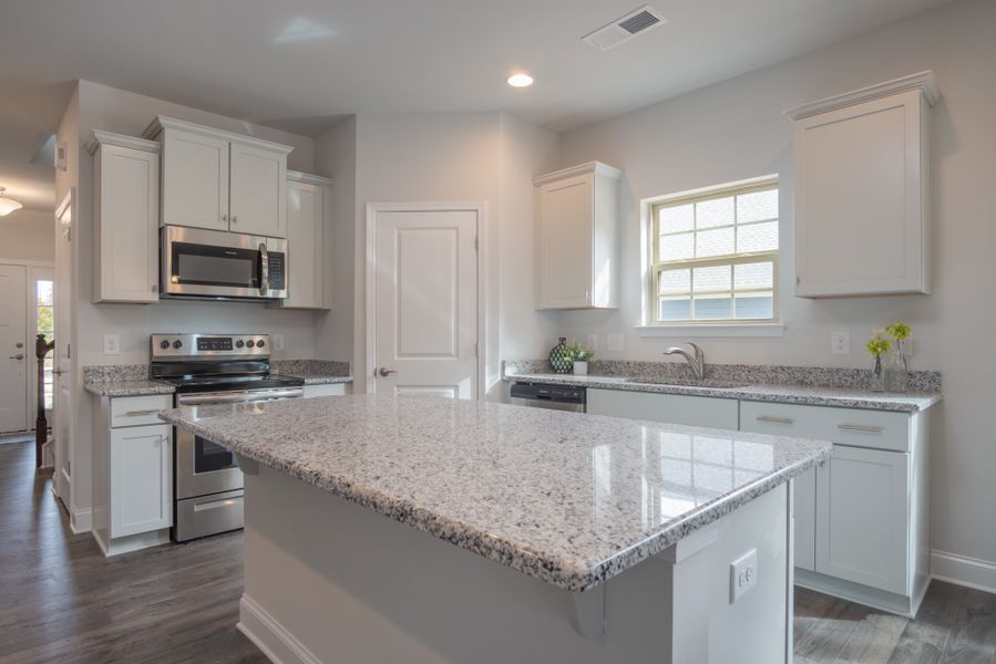 Representative furnished interior of a home built from the 3030 by Adams Homes in Parkland Place, Pace (Image 8).