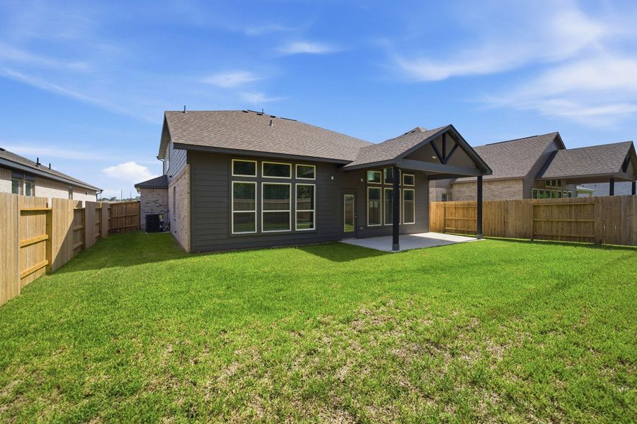 Exterior details and patio area of a home in Sundance Cove, Crosby (Image 16). Exterior details and patio area of a home in Sundance Cove, Crosby (Image 16).