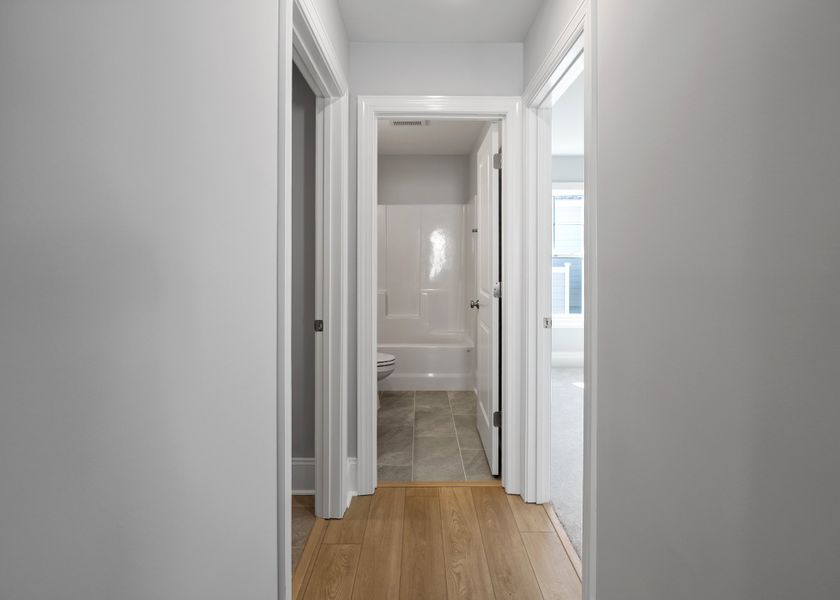 Spacious, unfurnished interior of a new home in Osprey Landing, Southport (Image 26).