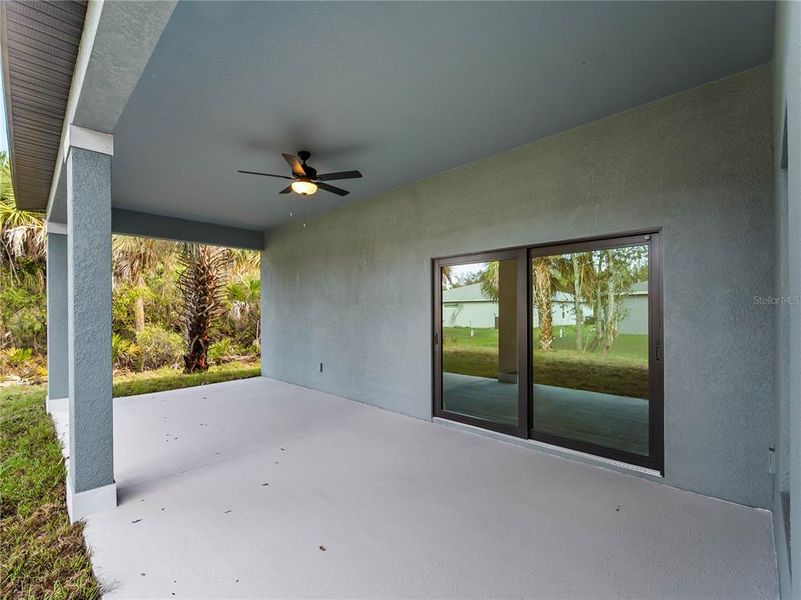 Exterior details and patio area of a home in , North Port (Image 35).