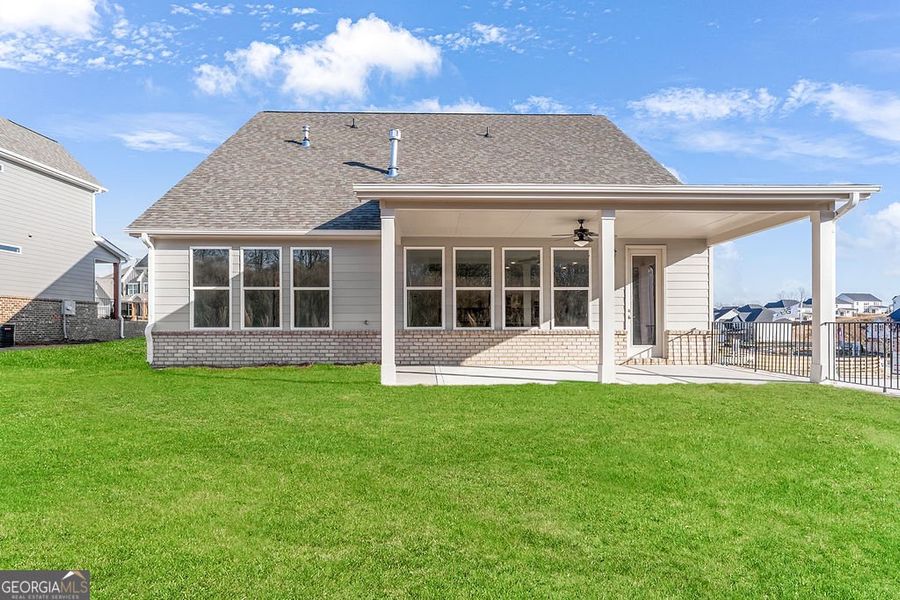 Exterior details and patio area of a home in The Manor at Gainesville Township, Gainesville (Image 4).