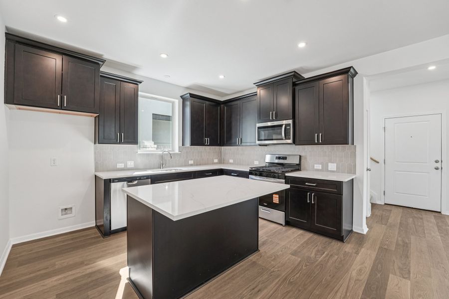 Furnished interior view inside a new home in Sage Hollow, Kyle (Image 6).
