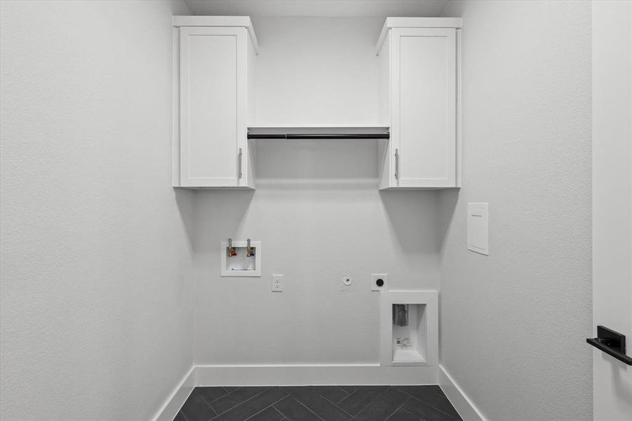 Laundry Room Featuring Cabinet Storage & Clothing Rack.