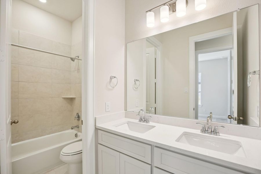 Furnished interior view inside a new home in Woodhavyn 50', Magnolia (Image 10).