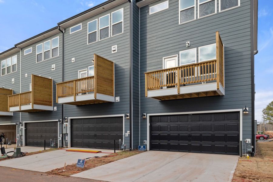 Front exterior of a new home in Everton, Durham, NC, highlighting curb appeal (Image 2). Front exterior of a new home in Everton, Durham, NC, highlighting curb appeal (Image 2).