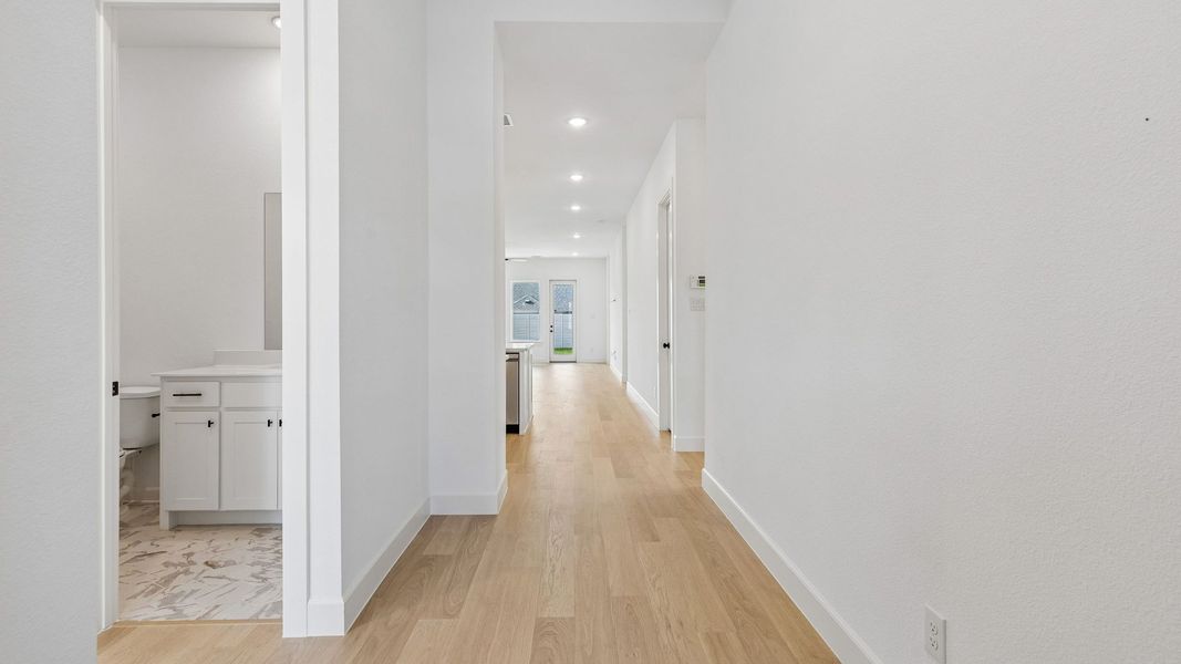 Representative unfurnished interior of a home built from the Chapelle III by Normandy Homes in Rainwater Crossing, Celina (Image 22).