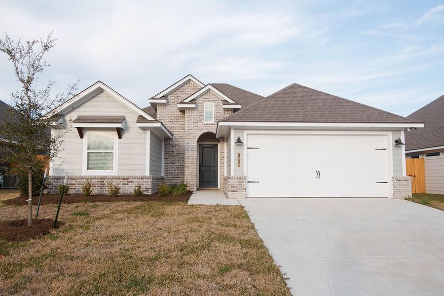 Representative exterior photo of a completed home built from the The Holly by Avonley Homes in Bonham Trace, Bryan, TX (Image 1).