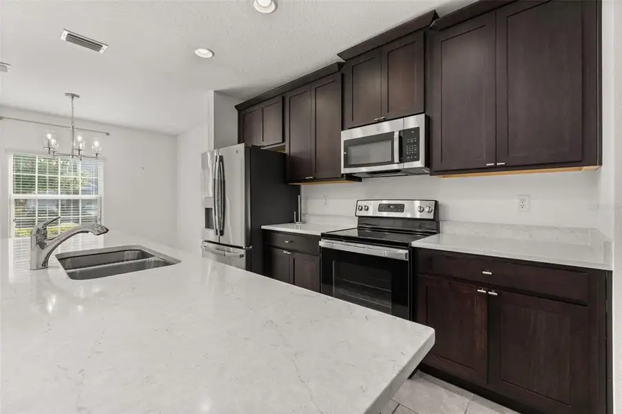 Furnished interior view inside a new home in , Davenport (Image 14).