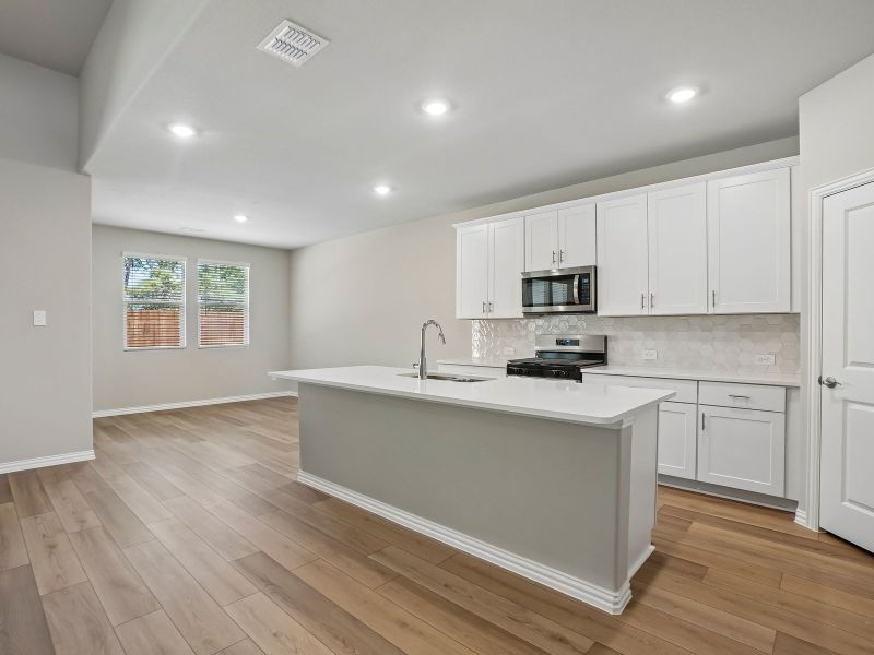 Furnished interior view inside a new home in Parks at Foster Crossing - Premier Series, Anna (Image 6).