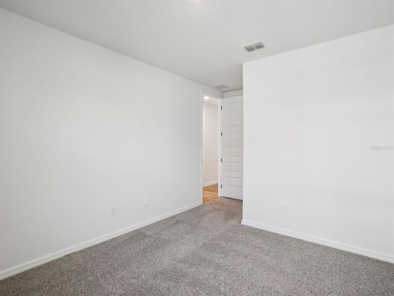 Spacious, unfurnished interior of a new home in Two Rivers - Signature Series, Zephyrhills (Image 26). Spacious, unfurnished interior of a new home in Two Rivers - Signature Series, Zephyrhills (Image 26).