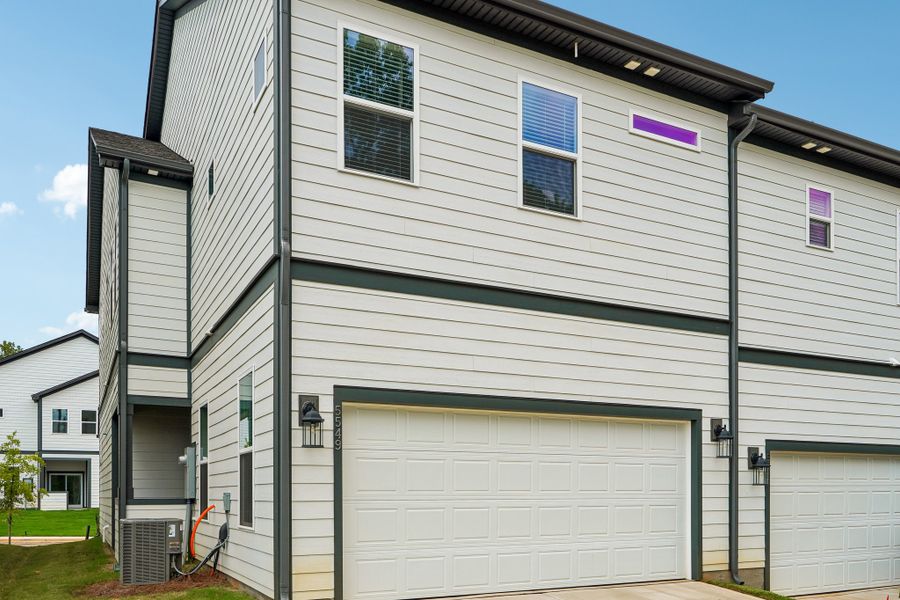 Exterior details and patio area of a home in Terraces at the Exchange, Indian Land (Image 19).