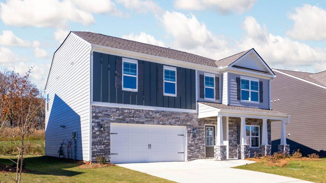 Front exterior of a new home in Prairie Pass, Apison, TN, highlighting curb appeal (Image 16).