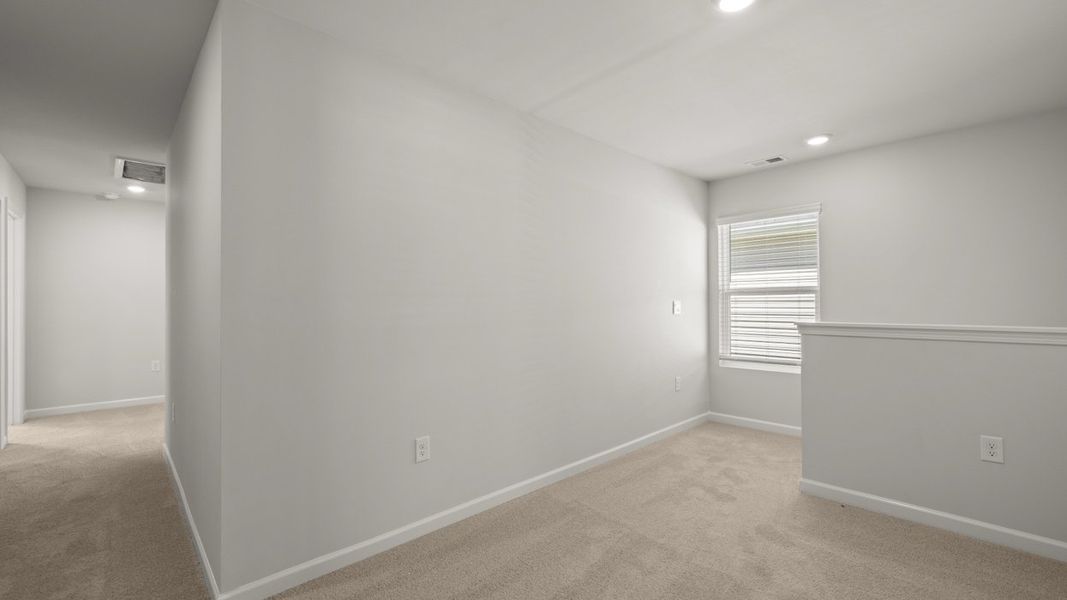 Representative unfurnished interior of a home built from the Robie by D.R. Horton in Highland Hills, Graniteville (Image 15).