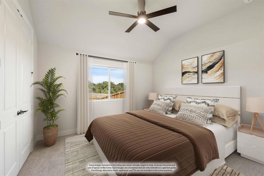 Bedroom with vaulted ceiling, ceiling fan, carpet flooring, and a window with natural light