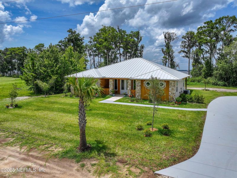 Front exterior of a new home in , East Palatka, FL, highlighting curb appeal (Image 35). Front exterior of a new home in , East Palatka, FL, highlighting curb appeal (Image 35).