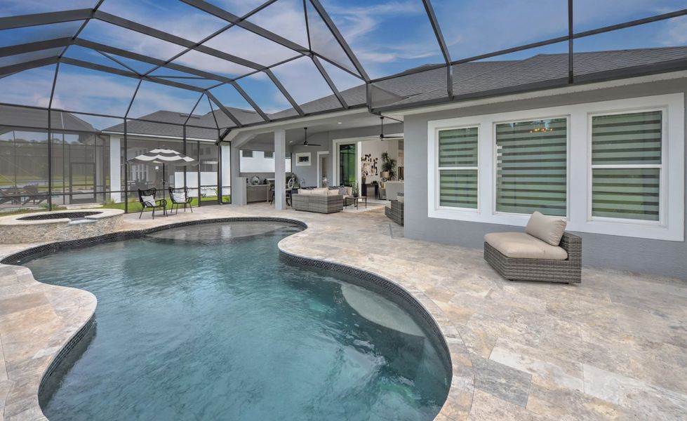 Exterior details and patio area of a home in Plantation Bay, Ormond Beach (Image 21).