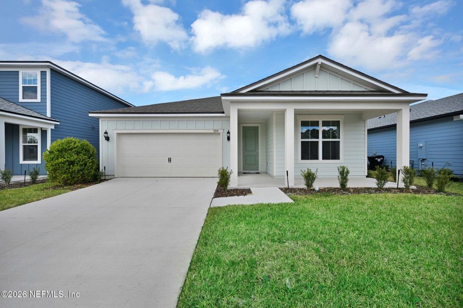 Front exterior of a new home in Hyland Trail, Green Cove Springs, FL, highlighting curb appeal (Image 19).