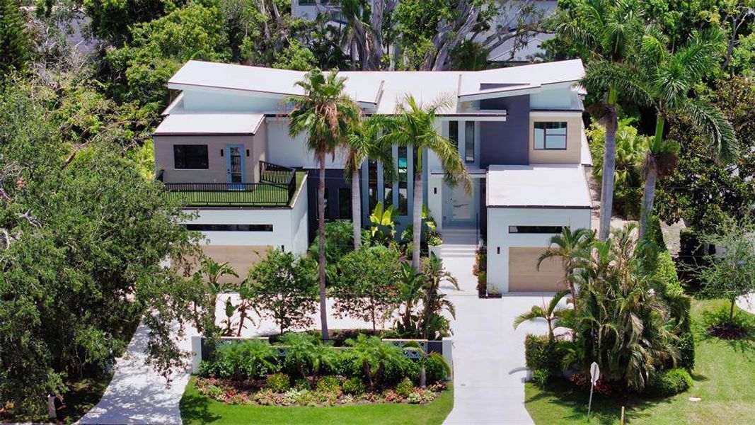 Front exterior of a new home in , Sarasota, FL, highlighting curb appeal (Image 30).
