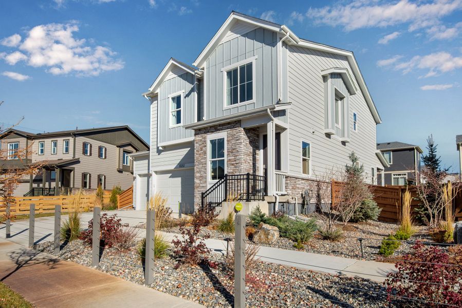 Representative exterior photo of a completed home built from the The Tempo by Tri Pointe Homes in Reunion, Commerce City, CO (Image 2). Representative exterior photo of a completed home built from the The Tempo by Tri Pointe Homes in Reunion, Commerce City, CO (Image 2).