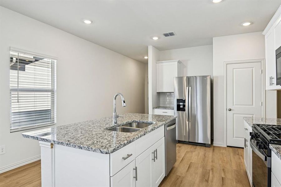 Furnished interior view inside a new home in Lakehaven - Spring Series, Farmersville (Image 18).