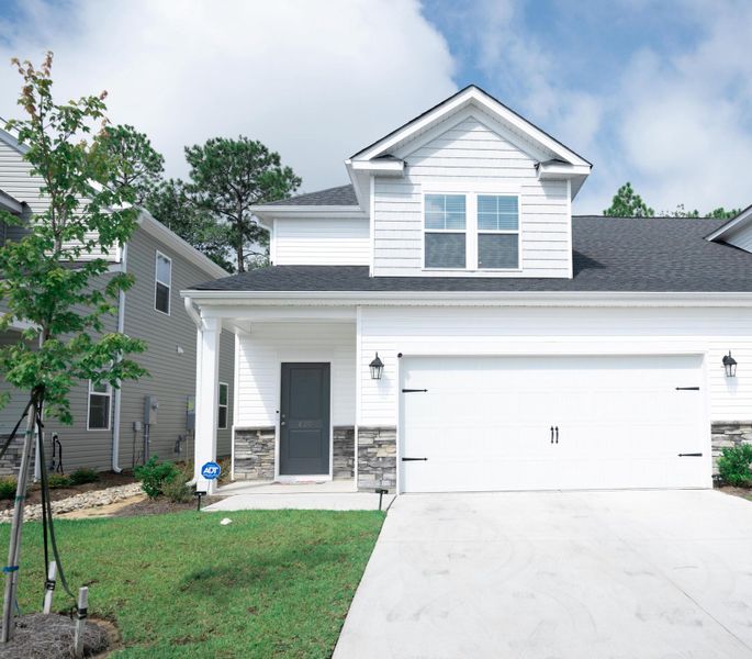 Front exterior of a new home in , Lexington, SC, highlighting curb appeal (Image 2). Front exterior of a new home in , Lexington, SC, highlighting curb appeal (Image 2).
