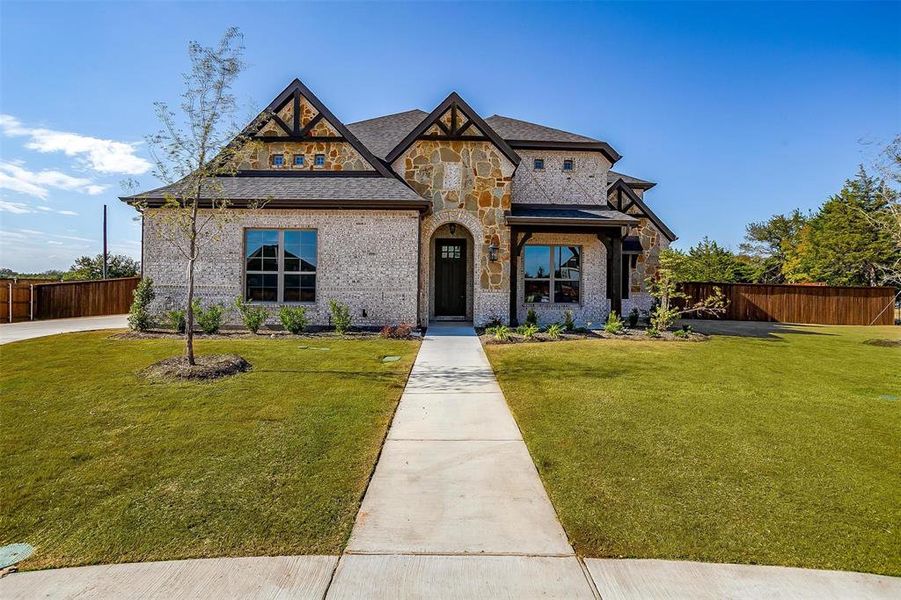 View of front of home with a front lawn