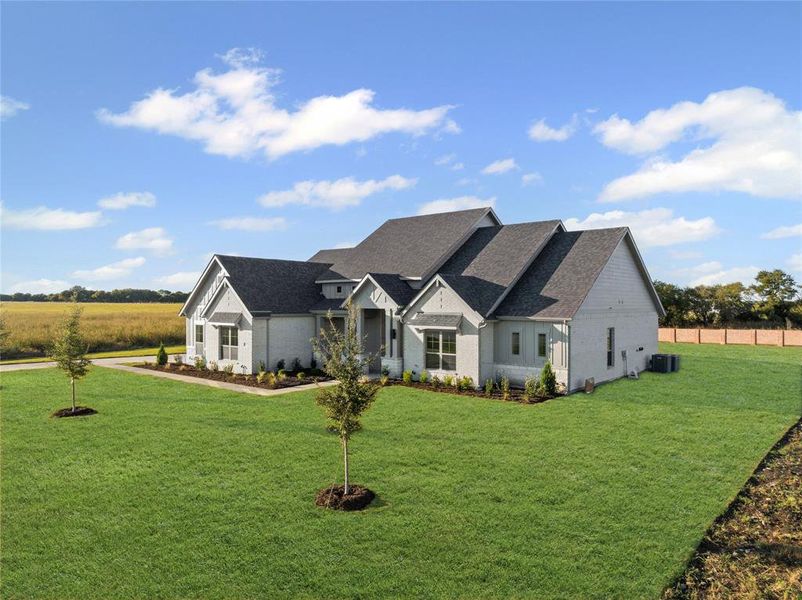 Front exterior of a new home in Levante - 1 Acre Lots, Waxahachie, TX, highlighting curb appeal (Image 22).