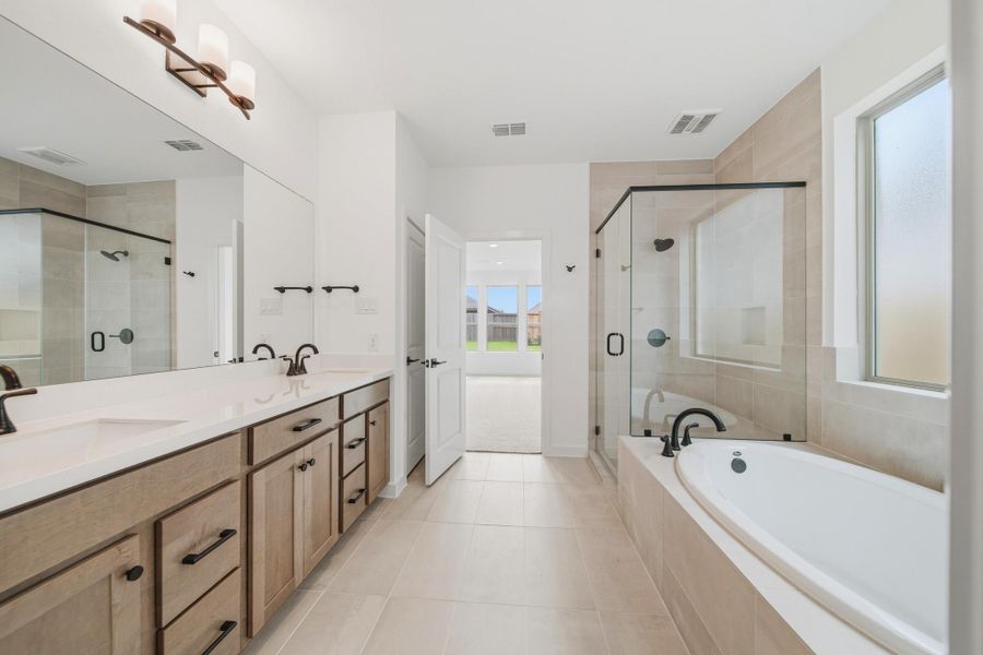 Furnished interior view inside a new home in Sienna 45', 50', Missouri City (Image 8).