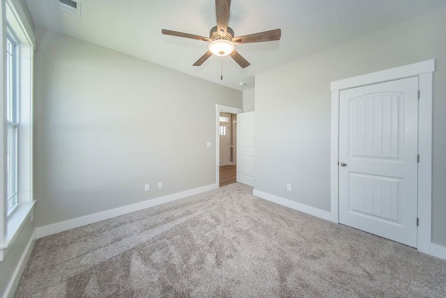 Representative unfurnished interior of a home built from the Beaumont Elite by Enchanted Homes in Pointe Summit, Slater-Marietta (Image 29).