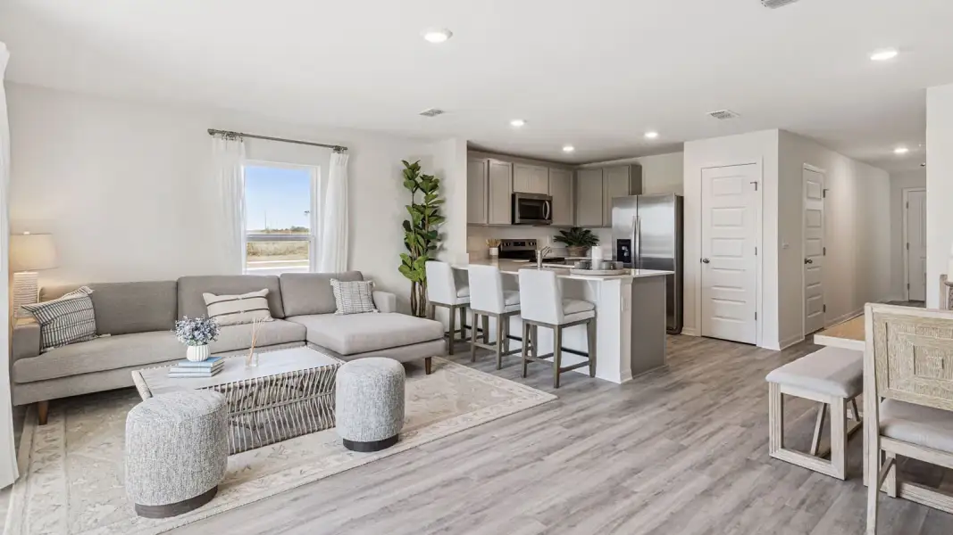 Furnished interior view inside a new home in Atria at Ridgewood Lakes, Davenport (Image 5).