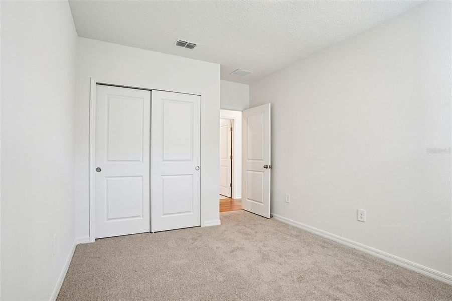 Spacious, unfurnished interior of a new home in Ridgehaven - Villas, Ormond Beach (Image 38).