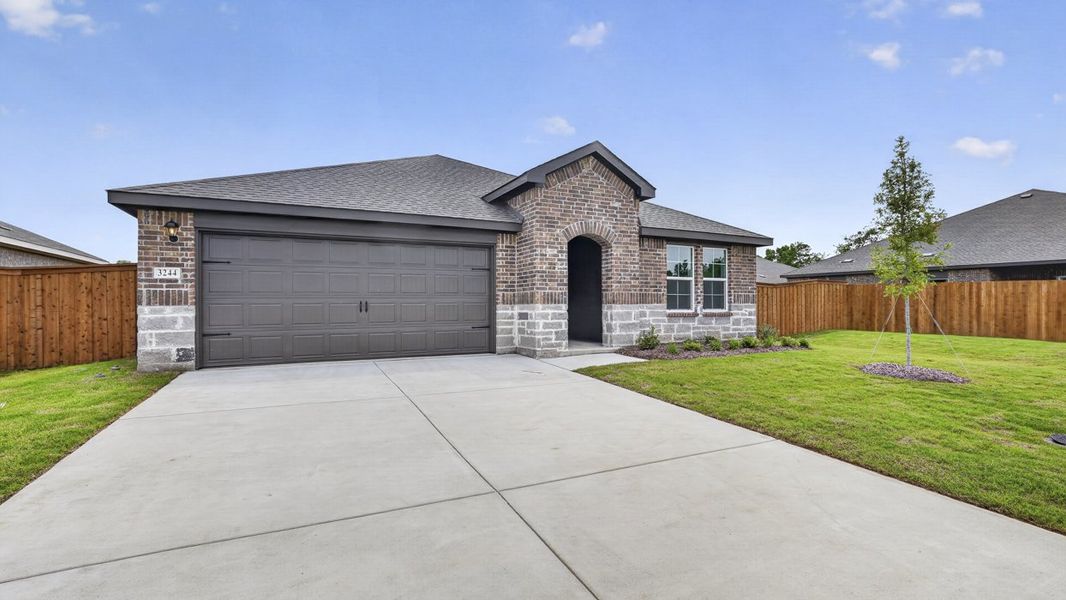 Front exterior of a new home in Forestbrook Estates, Paris, TX, highlighting curb appeal (Image 1). Front exterior of a new home in Forestbrook Estates, Paris, TX, highlighting curb appeal (Image 1).