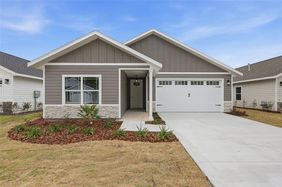 Front exterior of a new home in , Gainesville, FL, highlighting curb appeal (Image 2). Front exterior of a new home in , Gainesville, FL, highlighting curb appeal (Image 2).
