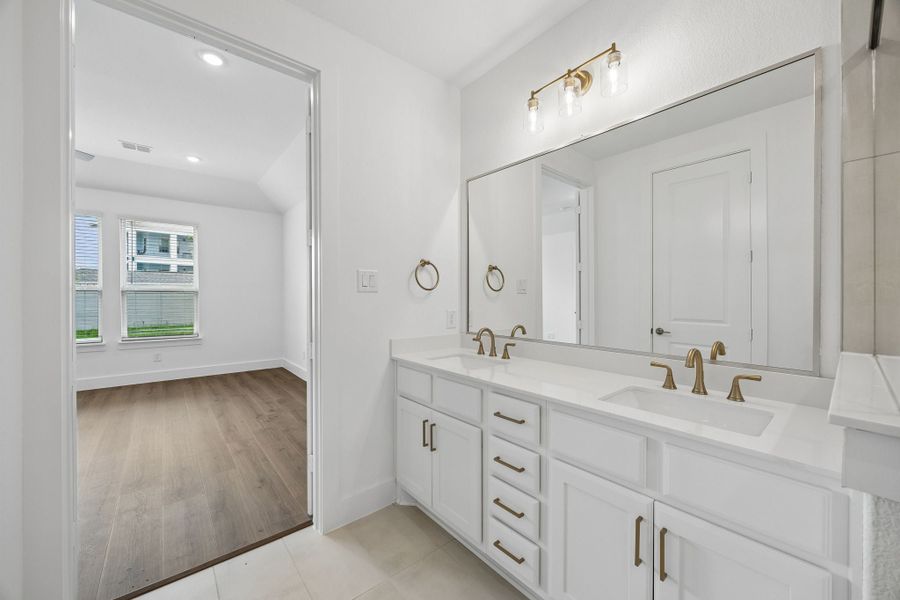 Representative furnished interior of a home built from the Winspear by Centre Living Homes in Painted Tree Woodland West, McKinney (Image 12).