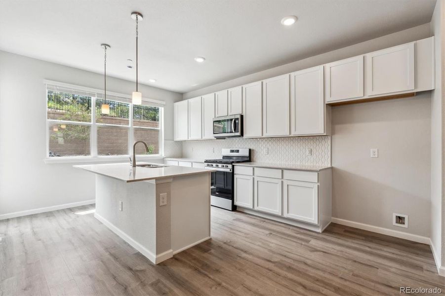 Furnished interior view inside a new home in Townhome Collection at Grand Vue at Interlocken, Broomfield (Image 4).