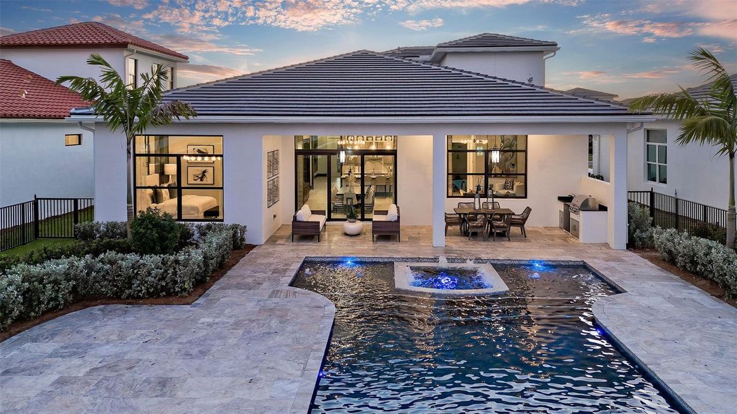 Exterior details and patio area of a home in Astor Creek Golf & Country Club, Port St. Lucie (Image 2).