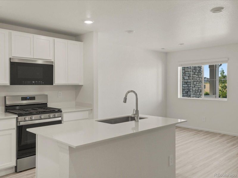 Furnished interior view inside a new home in Skyview at High Point, Aurora (Image 3).