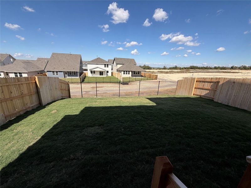 Exterior details and patio area of a home in Cannon Ranch 40s, Dripping Springs (Image 20).