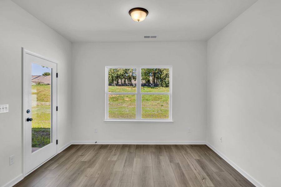 Dining area with lots of natural lighting!