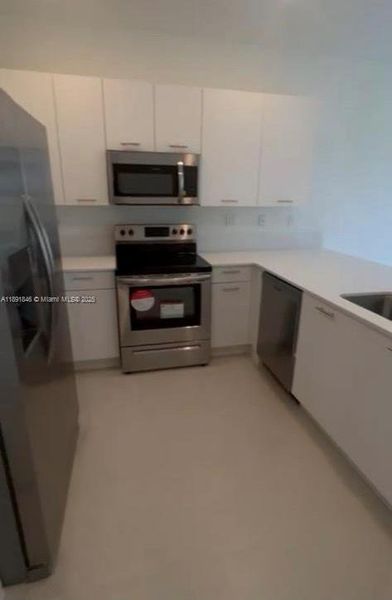 Furnished interior view inside a new home in , Miami (Image 6).