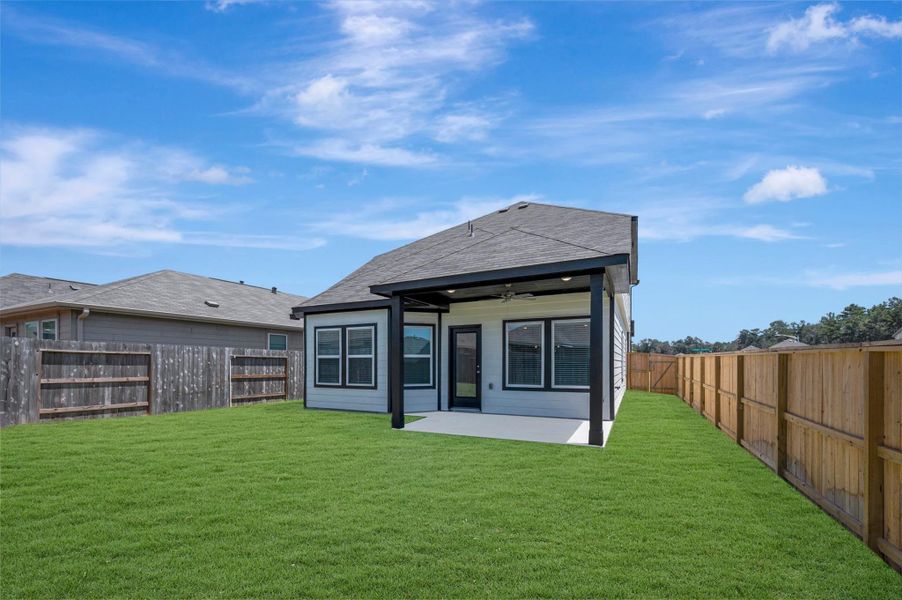 Exterior details and patio area of a home in Pinewood at Grand Texas, New Caney (Image 15). Exterior details and patio area of a home in Pinewood at Grand Texas, New Caney (Image 15).