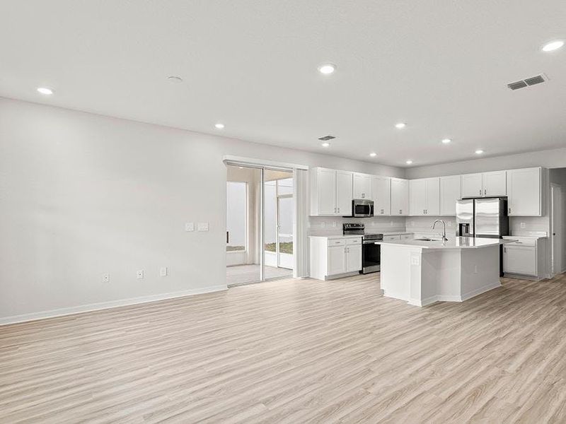 Enjoy a sunny, open living area - Danyella bungalow by Highland Homes