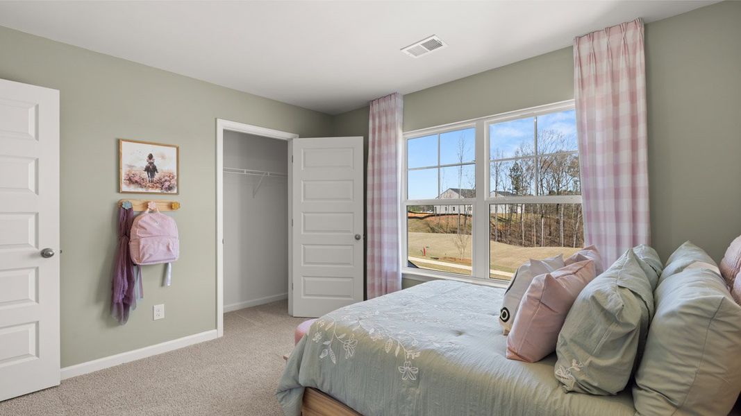 Representative furnished interior of a home built from the HAYDEN Express by D.R. Horton in WillowBrook, Winder (Image 56).