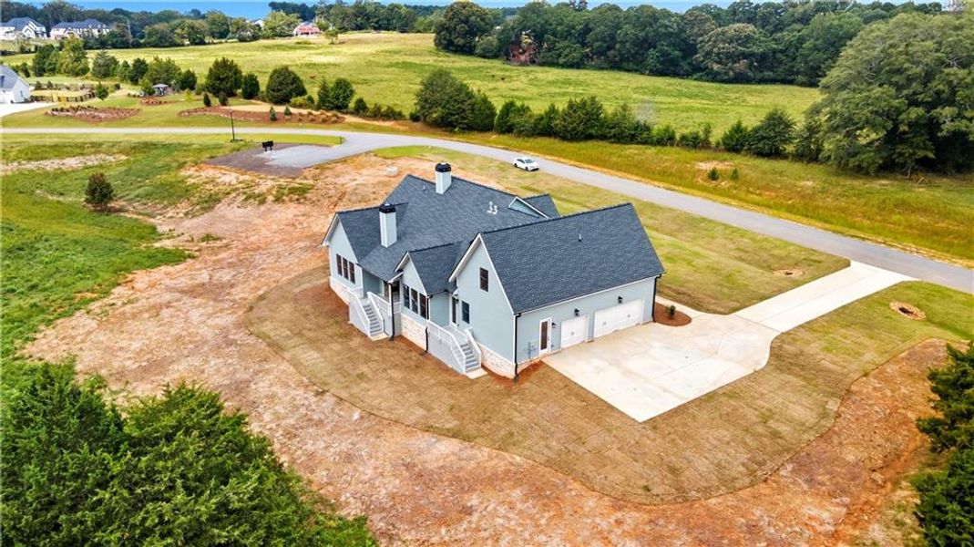 Front exterior of a new home in Old Town Estates, Dacula, GA, highlighting curb appeal (Image 28).