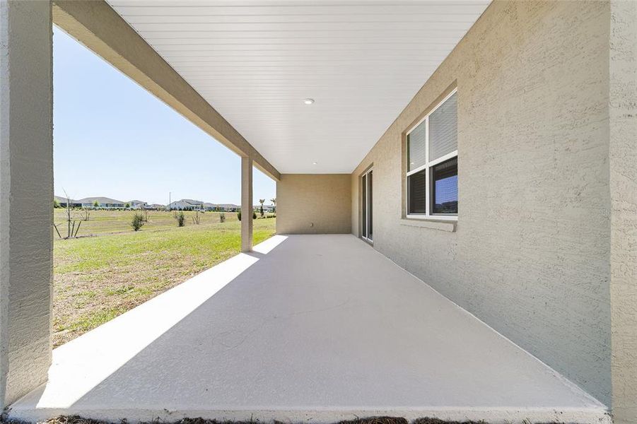 Exterior details and patio area of a home in Calesa Township, Ocala (Image 3).