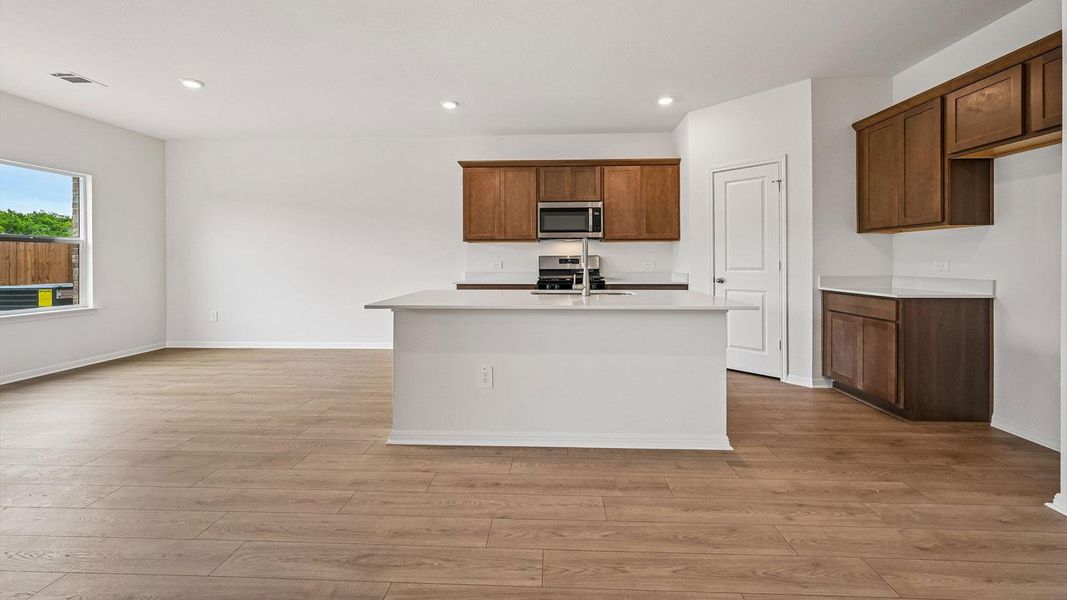 Furnished interior view inside a new home in Bar W Ranch, Leander (Image 8).
