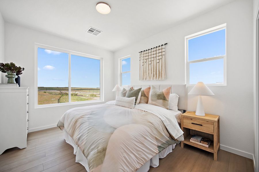 Furnished interior view inside a new home in Lyric at RidgeGate Condos, Lone Tree (Image 17).